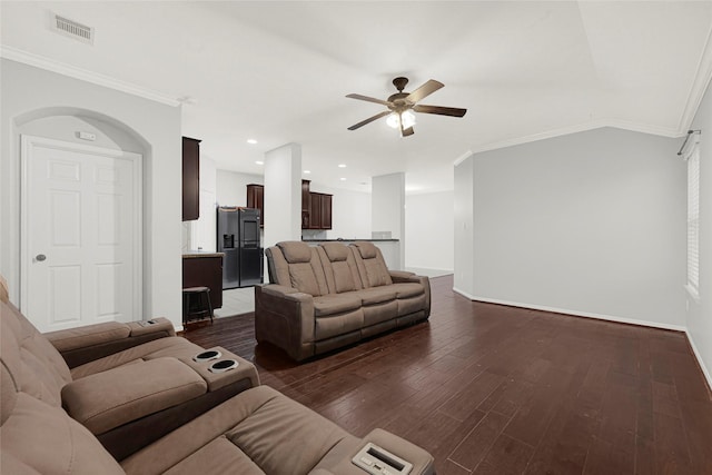 9002 Saint Laurent Ln, Houston, TX 77044 - living area with ceiling fan, dark wood-style floors, and crown molding