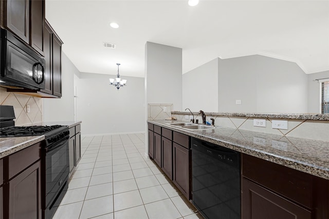 9002 Saint Laurent Ln, Houston, TX 77044 - kitchen with black appliances, tasteful backsplash, dark brown cabinetry, a chandelier, and light tile patterned floors