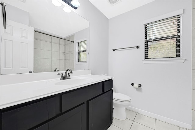 9002 Saint Laurent Ln, Houston, TX 77044 - bathroom with tile patterned floors, vanity, and a tile shower