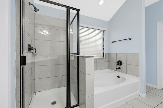 9002 Saint Laurent Ln, Houston, TX 77044 - full bath with a garden tub, a stall shower, tile patterned flooring, and vaulted ceiling