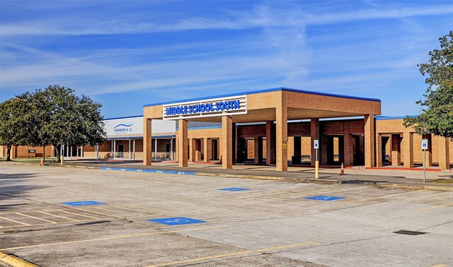 8410 Bay Oaks Dr, Baytown, TX 77523 - view of property featuring uncovered parking