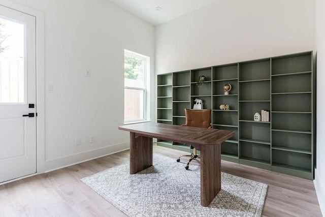 5703 Dolores St Unit A, Houston, TX 77057 - unfurnished office featuring light wood-style floors and baseboards