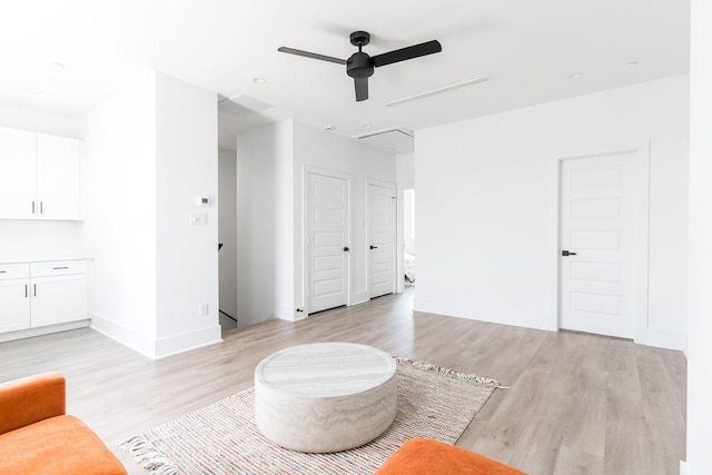 5703 Dolores St Unit A, Houston, TX 77057 - living room with light wood-type flooring and a ceiling fan