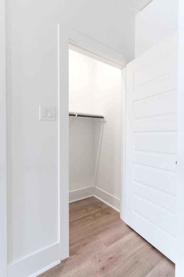 5703 Dolores St Unit A, Houston, TX 77057 - walk in closet with light wood-style flooring