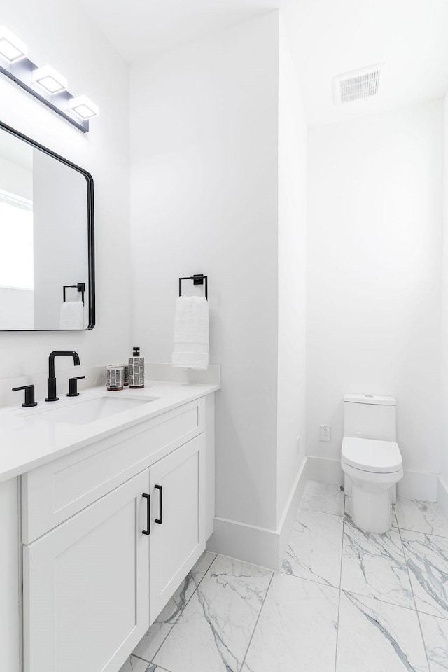 5703 Dolores St Unit A, Houston, TX 77057 - bathroom featuring marble finish flooring and vanity