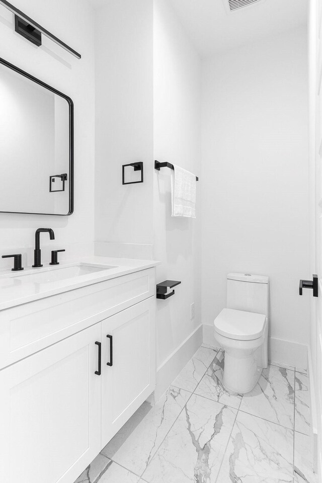 5703 Dolores St Unit A, Houston, TX 77057 - half bathroom featuring marble finish floors and vanity