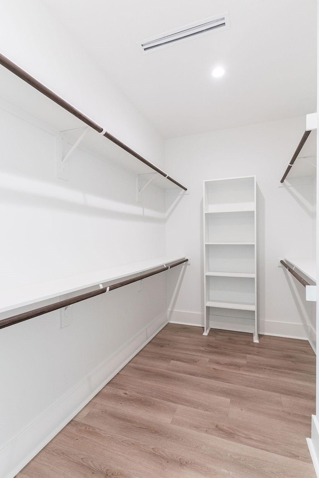 5703 Dolores St Unit A, Houston, TX 77057 - walk in closet featuring light wood-type flooring