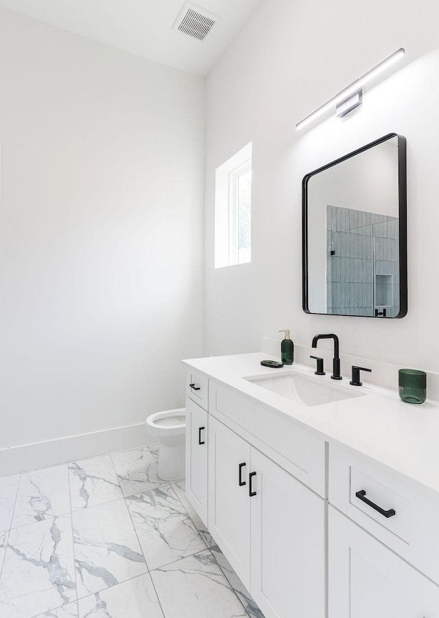 5703 Dolores St Unit A, Houston, TX 77057 - bathroom featuring vanity and marble finish flooring