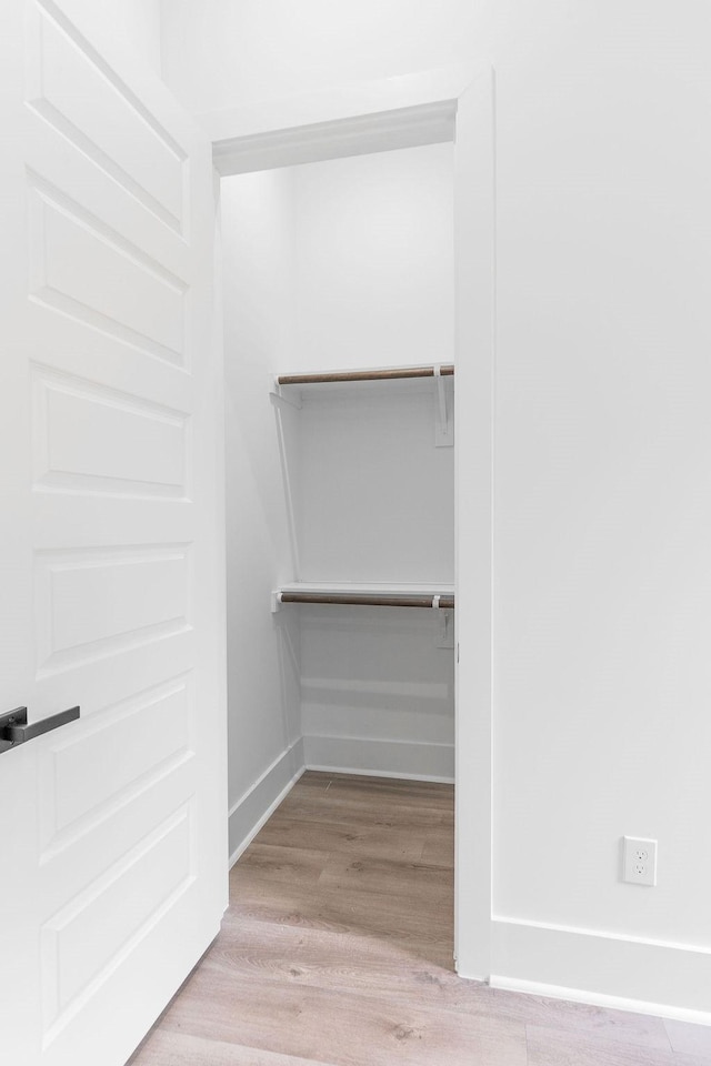 5703 Dolores St Unit A, Houston, TX 77057 - spacious closet featuring light wood-type flooring
