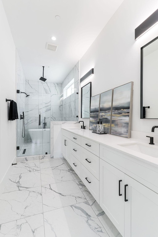 5703 Dolores St Unit A, Houston, TX 77057 - bathroom with a marble finish shower, double vanity, marble finish floors, recessed lighting, and a freestanding tub