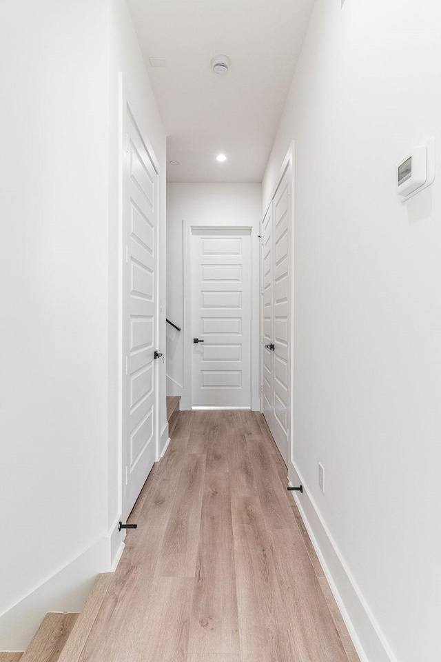 5703 Dolores St Unit A, Houston, TX 77057 - hall featuring light wood-type flooring and recessed lighting