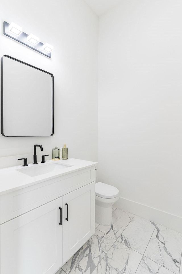 5703 Dolores St Unit A, Houston, TX 77057 - bathroom featuring marble look tile flooring and vanity