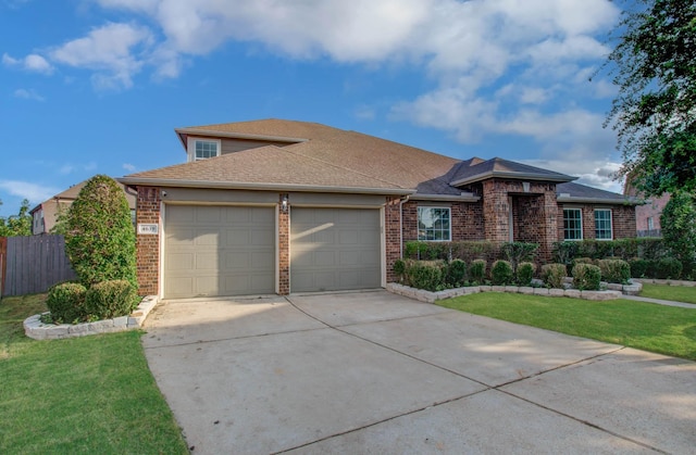 4639 Regal Shadow Ln, Sugar Land, TX 77479 - ranch-style house featuring brick siding, a garage, concrete driveway, and a shingled roof