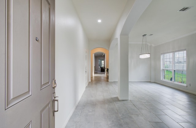 4639 Regal Shadow Ln, Sugar Land, TX 77479 - foyer entrance featuring arched walkways, recessed lighting, and ornamental molding