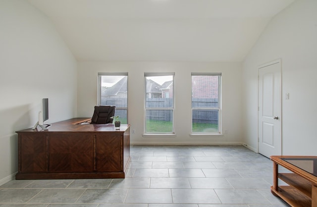 4639 Regal Shadow Ln, Sugar Land, TX 77479 - home office with vaulted ceiling, healthy amount of natural light, and light tile patterned floors