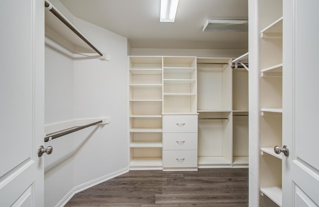 4639 Regal Shadow Ln, Sugar Land, TX 77479 - spacious closet with dark wood-style floors