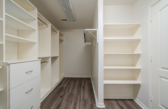 4639 Regal Shadow Ln, Sugar Land, TX 77479 - walk in closet with dark wood finished floors