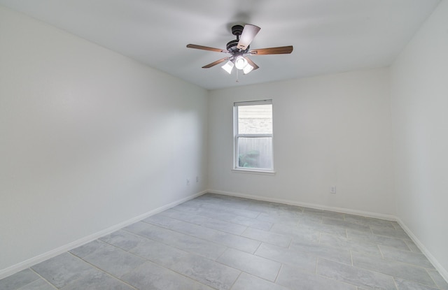 4639 Regal Shadow Ln, Sugar Land, TX 77479 - spare room featuring a ceiling fan and light tile patterned floors
