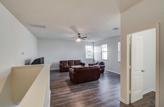4639 Regal Shadow Ln, Sugar Land, TX 77479 - living area featuring a ceiling fan and dark wood-type flooring