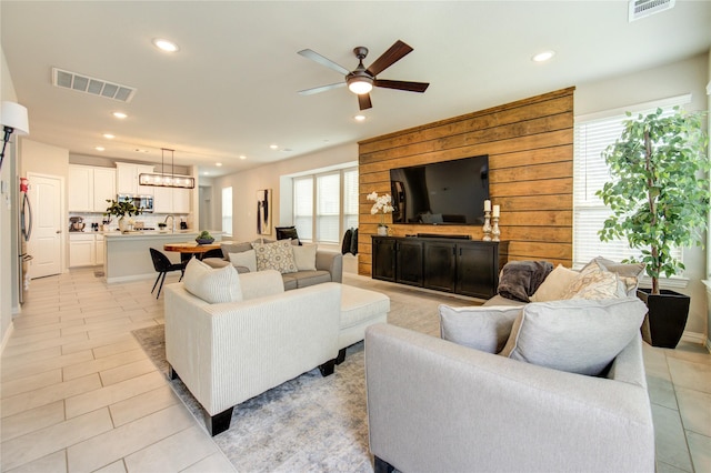 17715 White Lightning Way, Spring, TX 77379 - living room featuring a ceiling fan, recessed lighting, and light tile patterned floors