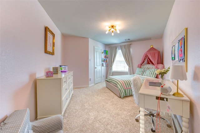17715 White Lightning Way, Spring, TX 77379 - bedroom with baseboards and light colored carpet