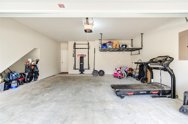 17715 White Lightning Way, Spring, TX 77379 - garage featuring a garage door opener and electric panel