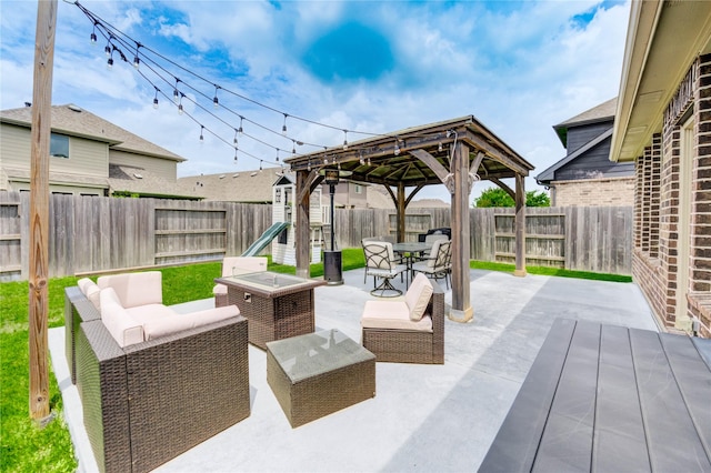 17715 White Lightning Way, Spring, TX 77379 - fenced backyard with a gazebo, an outdoor hangout area, and outdoor dining space