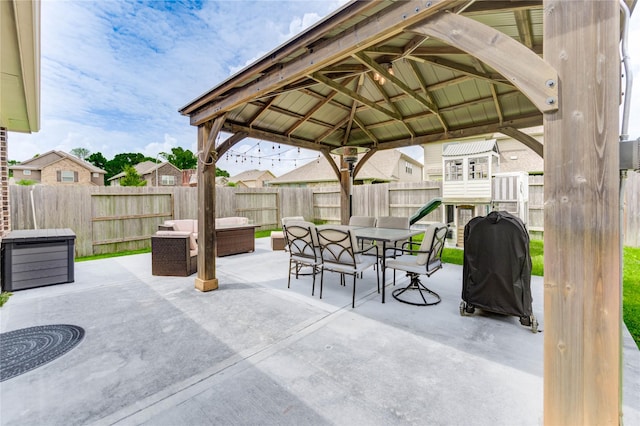 17715 White Lightning Way, Spring, TX 77379 - fenced backyard featuring a gazebo, outdoor dining area, a patio, and grilling area