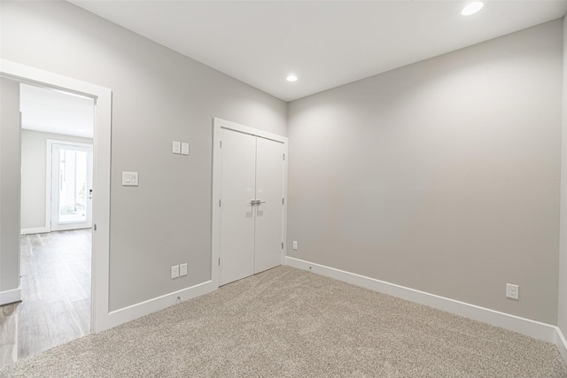 240 Julia St Unit D, Houston, TX 77022 - unfurnished bedroom with recessed lighting and carpet floors