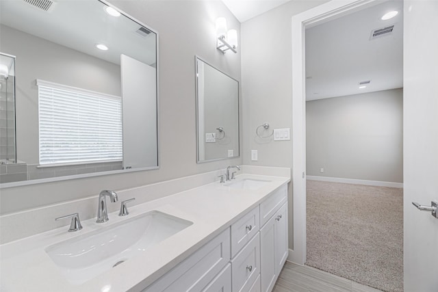 240 Julia St Unit D, Houston, TX 77022 - full bath featuring double vanity and recessed lighting