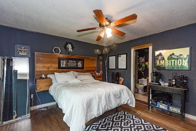 117 Pecan Dr, Baytown, TX 77520 - bedroom featuring hardwood / wood-style floors, a textured ceiling, and ceiling fan