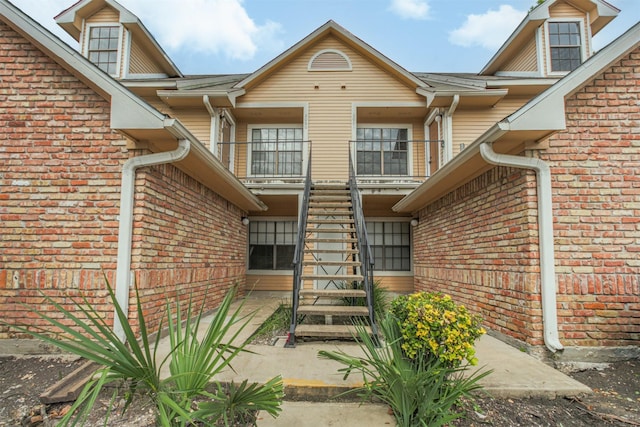 2300 Old Spanish Trl Unit 1060, Houston, TX 77054 - view of exterior entry with brick siding