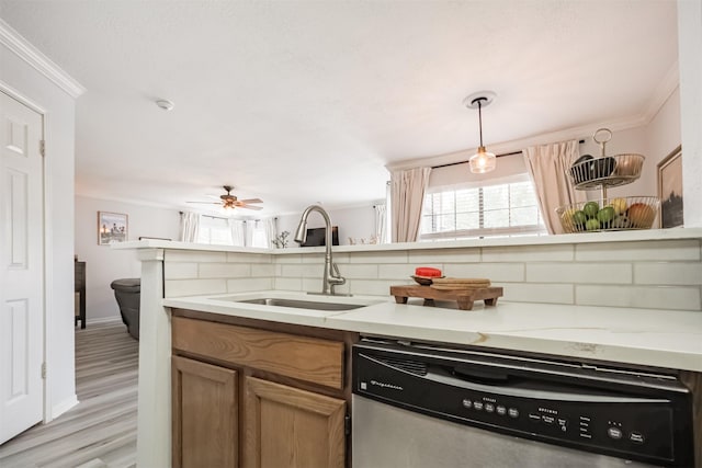 2300 Old Spanish Trl Unit 1060, Houston, TX 77054 - kitchen with dishwasher, crown molding, light wood-type flooring, a ceiling fan, and decorative light fixtures