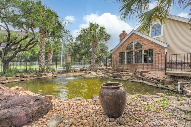 2300 Old Spanish Trl Unit 1060, Houston, TX 77054 - view of yard featuring a garden pond