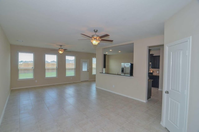 3634 Goldleaf Trail Dr, Katy, TX 77449 - unfurnished room with plenty of natural light, a ceiling fan, and light tile patterned floors