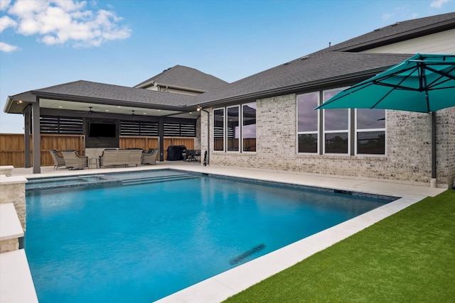 14115 Garibaldi Dr, Cypress, TX 77433 - view of swimming pool featuring outdoor lounge area, a pool with connected hot tub, ceiling fan, and a patio area
