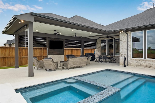 14115 Garibaldi Dr, Cypress, TX 77433 - view of swimming pool with a ceiling fan, a patio area, a pool with connected hot tub, and outdoor lounge area