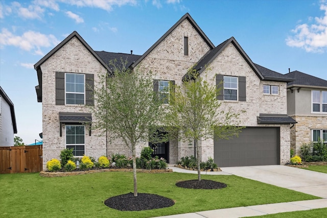 14115 Garibaldi Dr, Cypress, TX 77433 - view of front facade featuring brick siding, an attached garage, and driveway