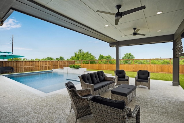14115 Garibaldi Dr, Cypress, TX 77433 - fenced backyard with a patio, outdoor lounge area, and a ceiling fan