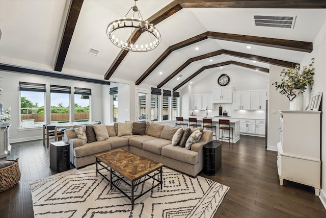 14115 Garibaldi Dr, Cypress, TX 77433 - living room featuring a chandelier, recessed lighting, beamed ceiling, dark wood-style flooring, and high vaulted ceiling