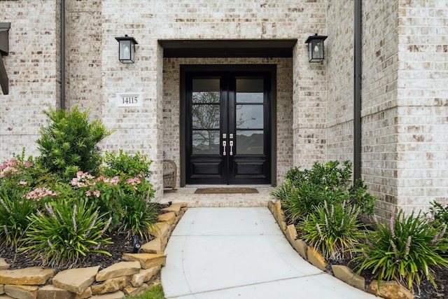 14115 Garibaldi Dr, Cypress, TX 77433 - entrance to property with french doors and brick siding