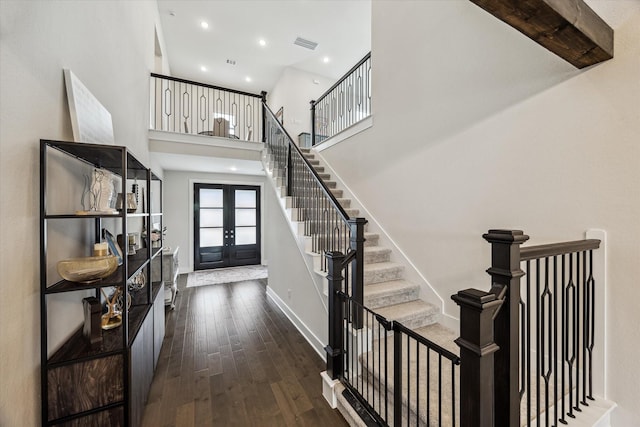 14115 Garibaldi Dr, Cypress, TX 77433 - entryway featuring french doors, dark wood-style flooring, stairway, recessed lighting, and a high ceiling