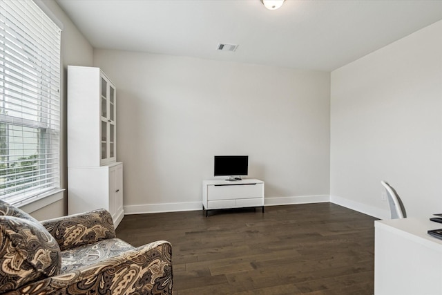 14115 Garibaldi Dr, Cypress, TX 77433 - sitting room with dark wood-style flooring and baseboards