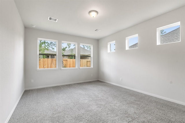 4402 Azalea Blossom Rd, Pinehurst, TX 77362 - carpeted empty room with baseboards