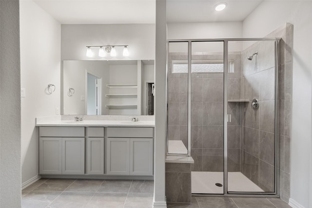 4402 Azalea Blossom Rd, Pinehurst, TX 77362 - full bath with double vanity, a stall shower, and tile patterned flooring