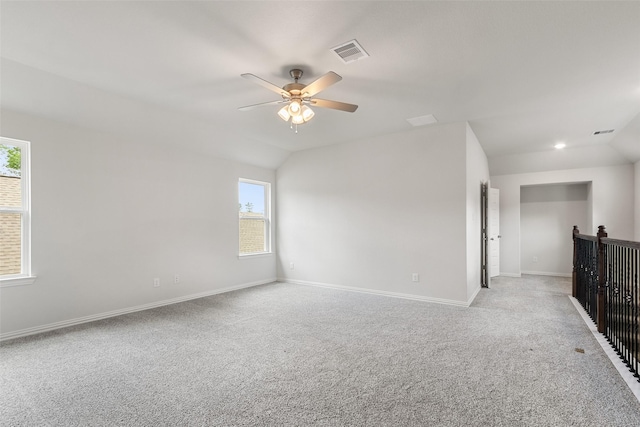 4402 Azalea Blossom Rd, Pinehurst, TX 77362 - unfurnished room featuring light carpet, ceiling fan, healthy amount of natural light, and vaulted ceiling