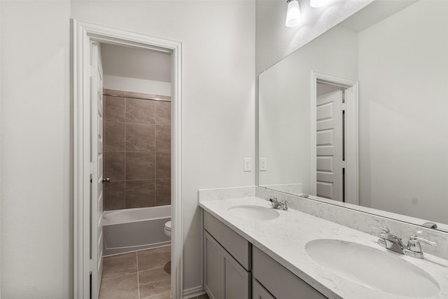 4402 Azalea Blossom Rd, Pinehurst, TX 77362 - full bath featuring double vanity, tile patterned floors, and shower / bathtub combination