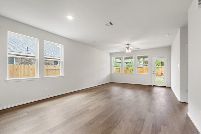 4402 Azalea Blossom Rd, Pinehurst, TX 77362 - spare room featuring a ceiling fan, wood finished floors, and recessed lighting