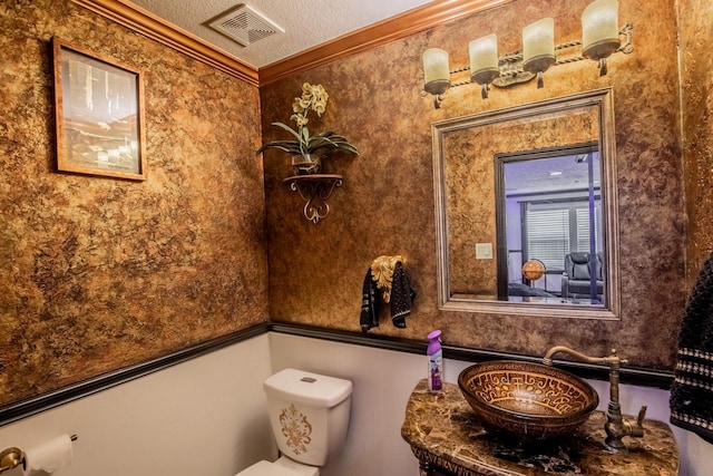 2019 Vanamen Ct, Conroe, TX 77304 - half bathroom with crown molding and a textured ceiling