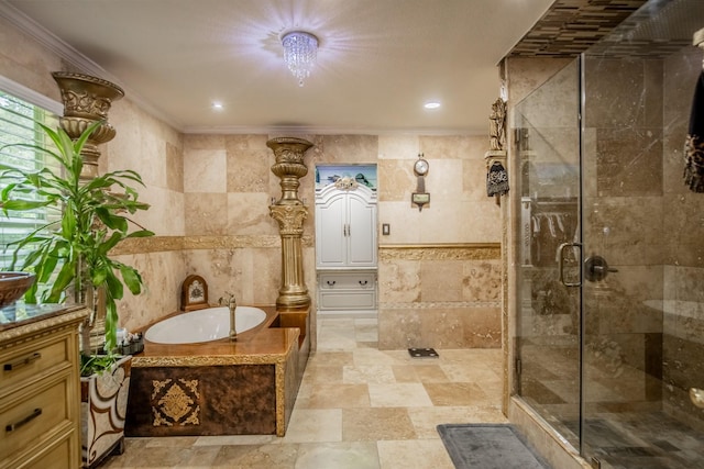 2019 Vanamen Ct, Conroe, TX 77304 - bathroom featuring a bath, a stall shower, tile walls, vanity, and ornamental molding